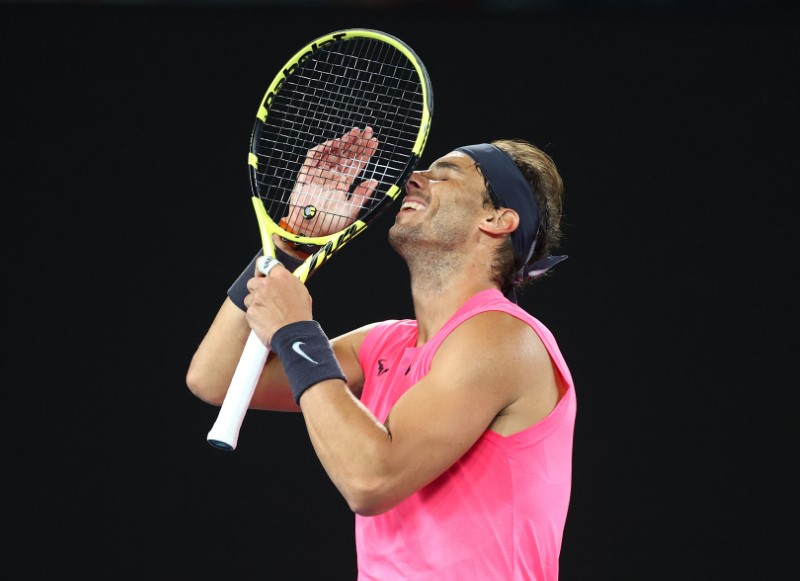 Sealed with a kiss, Nadal eases into third round in Melbourne